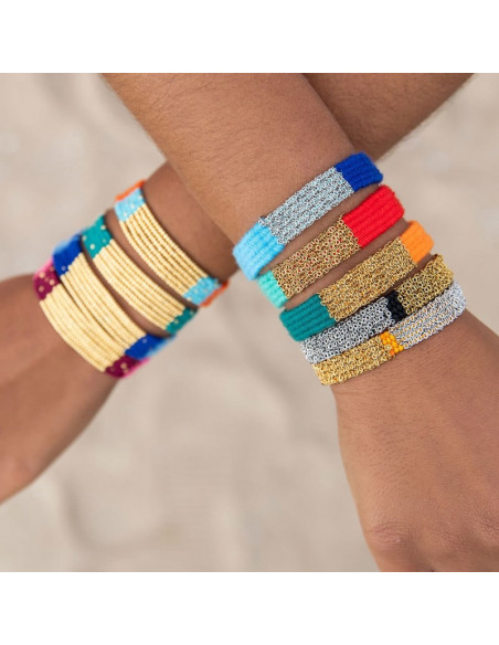 Pulsera lana rojo y turquesa con malla de acero dorada