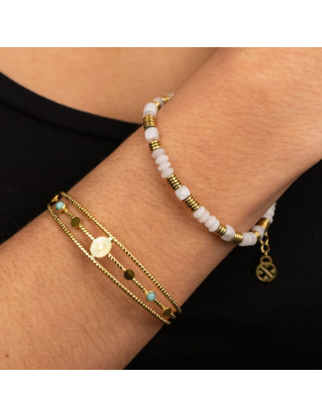 Brazalete abierto con detalles de piedras de cristal turquesa